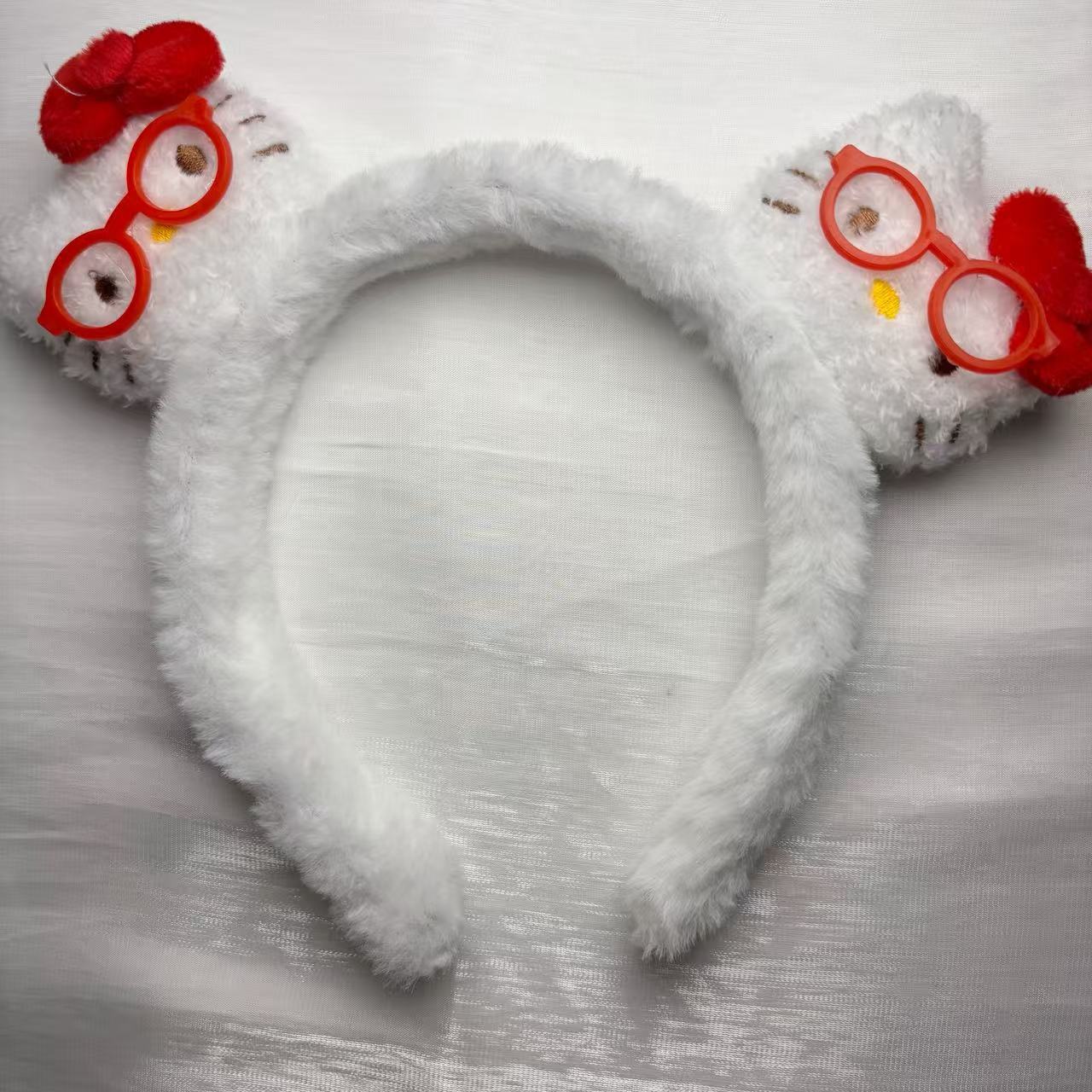 Nuevo tipo de peluche divertido Kitty cabello de gato lindos dibujos animados adornos para el cabello otoño y invierno lavado de la cara especial cabello al por mayor