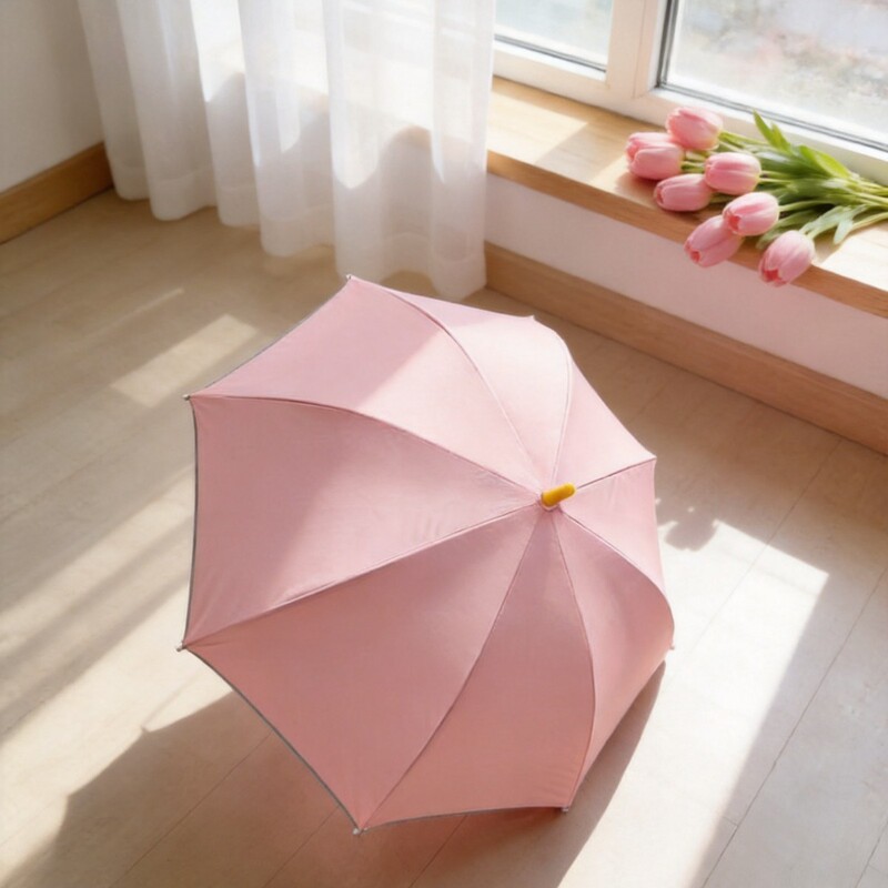 Pink solid color long-handled umbrella with contrasting color reflective trim on the edge, making nighttime travel safer. Customizable Pink solid color long-handled umbrella with contrasting color reflective trim on the edge, making nighttime travel safer. Customizable