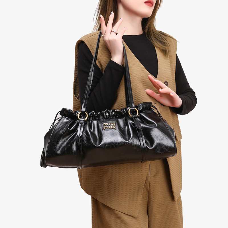 Bolsa de lujo ligera de cuero de textura alta para mujeres 2026 nuevo otoño invierno nicho diseño de hombro bajo la axila bolsa de nube