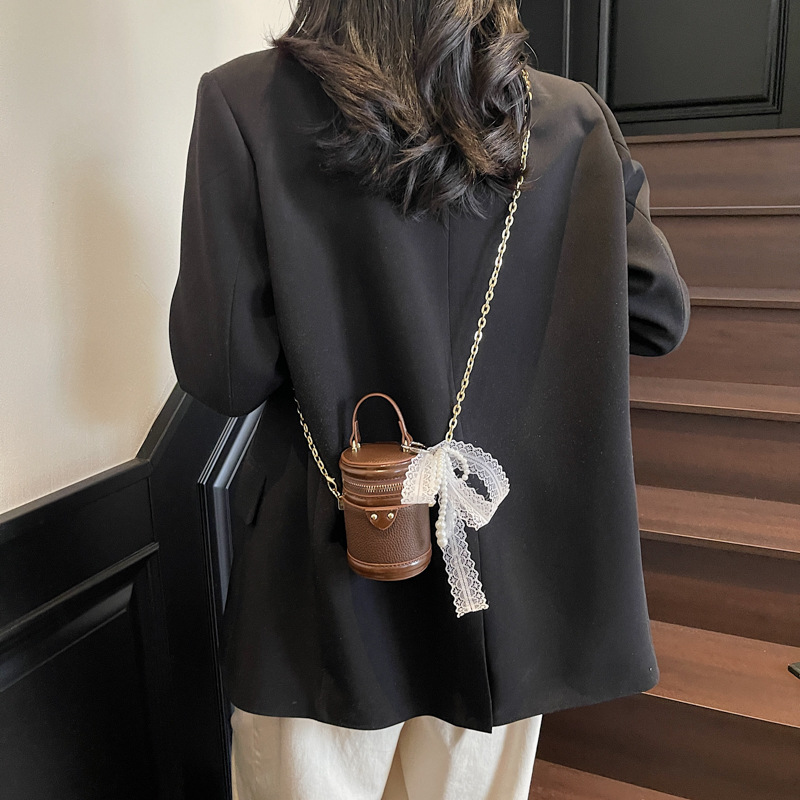 Transfronterizo de alta calidad moda mini bolso de cubo portátil para mujeres 2025 nuevo nicho de diseño universal mochila de hombro