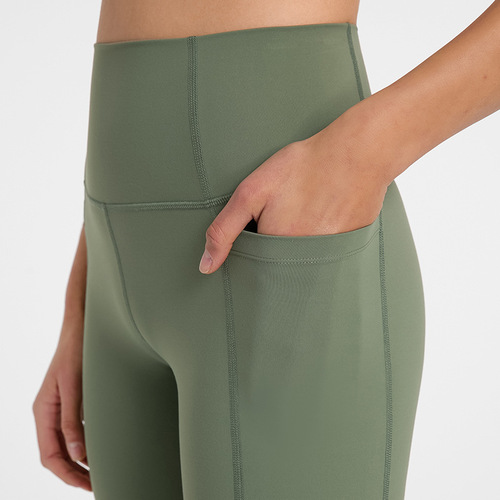 Spring and summer new style stitched side pocket sports quarter pants for women with high waist and hip lift elastic tight fitness yoga shorts