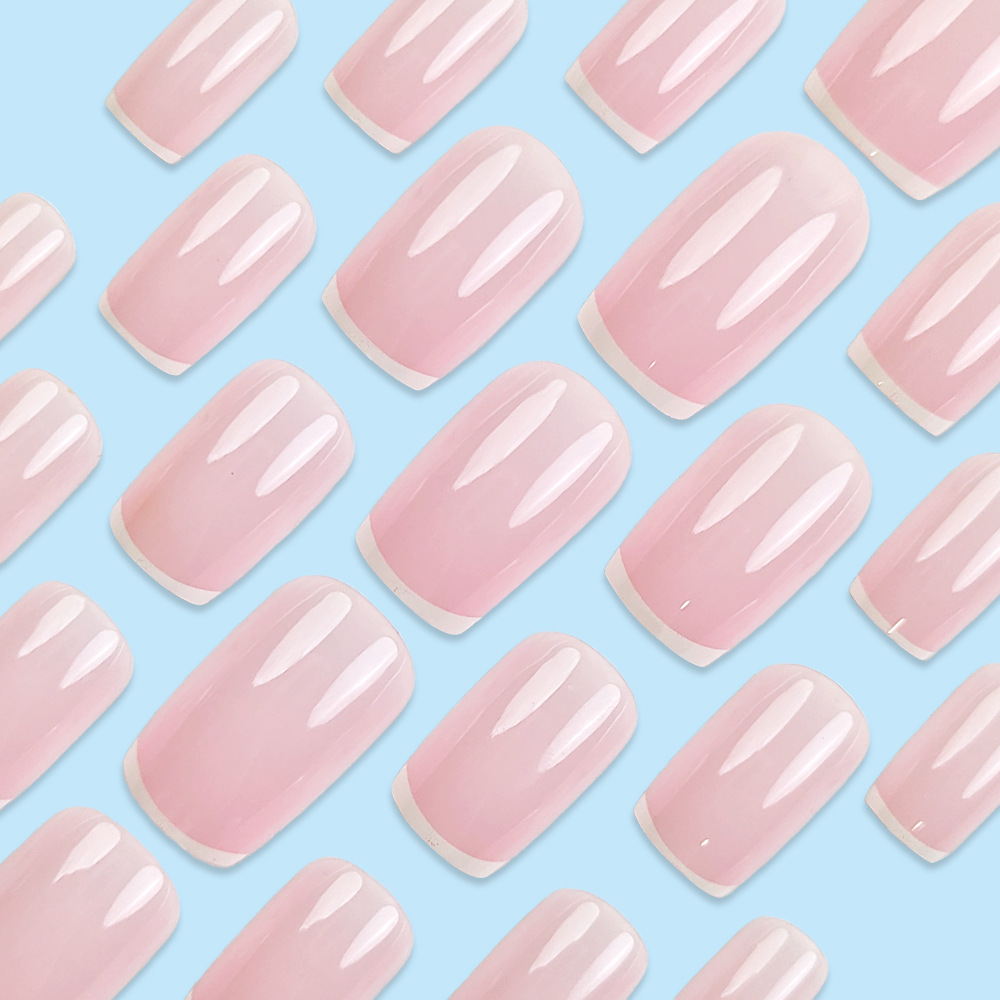 Ventas transfronterizas de polvo desnudo de manicuras francesas temperamento suave larga cabeza plana 24 piezas de parche de uñas falsas
