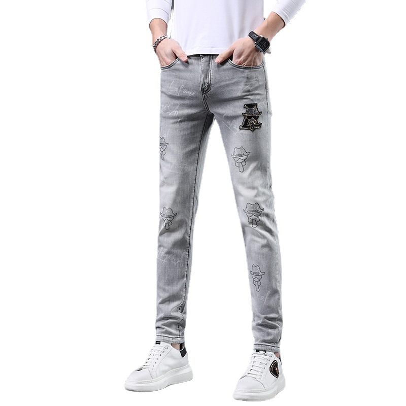 Jeans para hombre nueva tendencia en el verano de 2022 slim y casual marca Joker pantalones de pies grises de perforación caliente marea._voghion.com