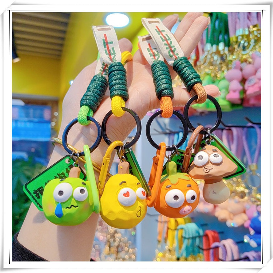 Llavero de muñeca de frutas y verduras de dibujos animados creativos pareja lindo bolso colgante llavero de coche regalo de Yiwu