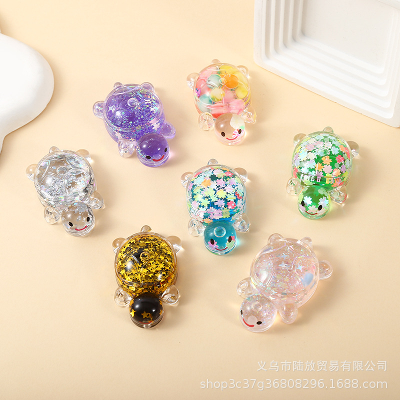 Nuevo color creativo arenas movedizas destellantes, pequeñas tortugas, adornos de escritorio de alto valor, bolsas ciegas al por mayor, dupla de Douyin