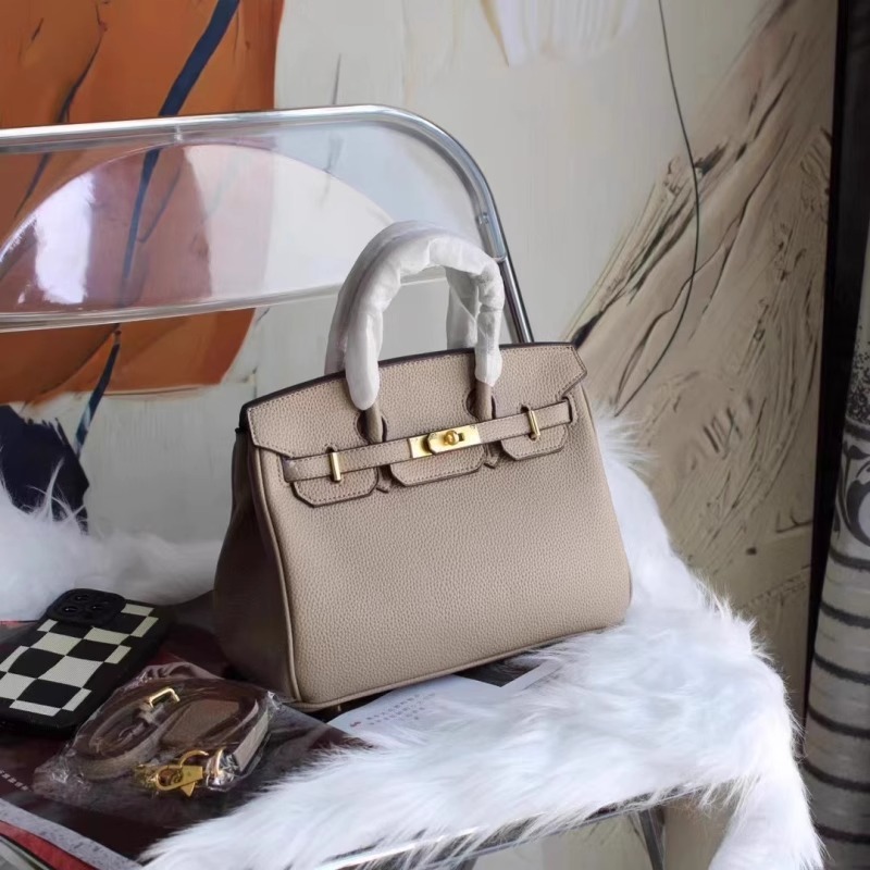 国境を越えた女性用バッグの供給 Douyin プラチナバッグ 本革ポータブルケリーバッグ ハイエンドファッション多用途ショルダークロスボディバッグ|undefined