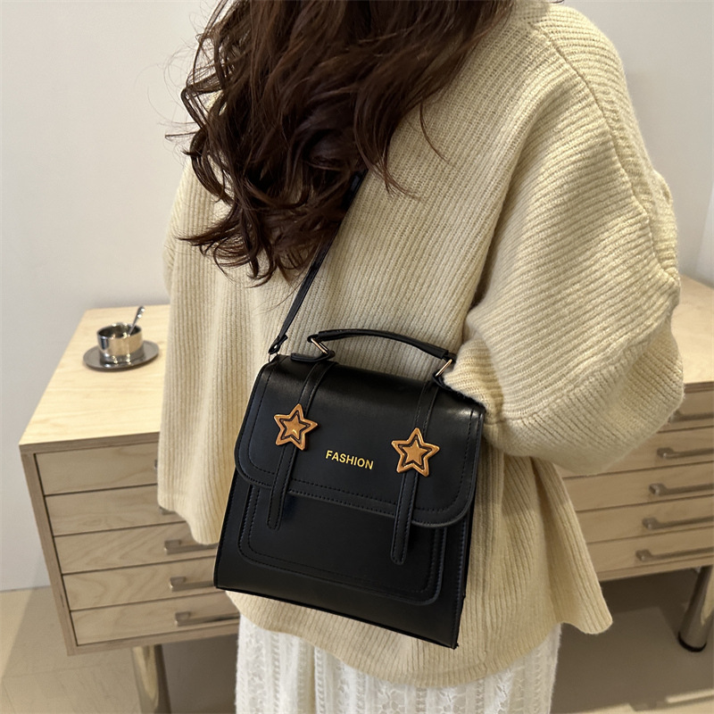 Mochila retro versátil para mujeres nicho diseño 2024 nueva moda alta textura mochila universitaria pequeña