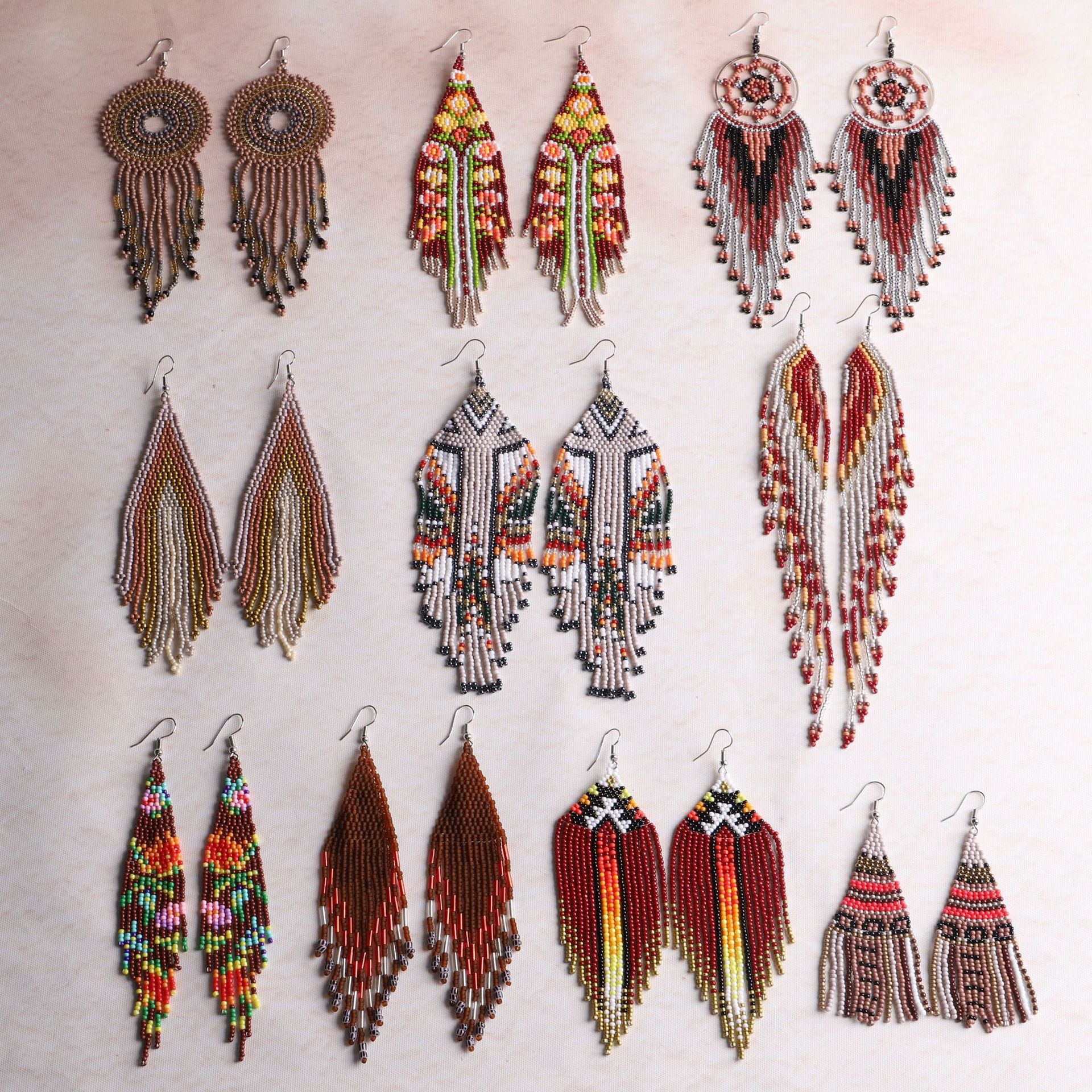 Pendientes de borla larga marrón de estilo étnico retro europeo y americano Pendientes de cuentas hechos a mano bohemia para mujer Pendientes al por mayor
