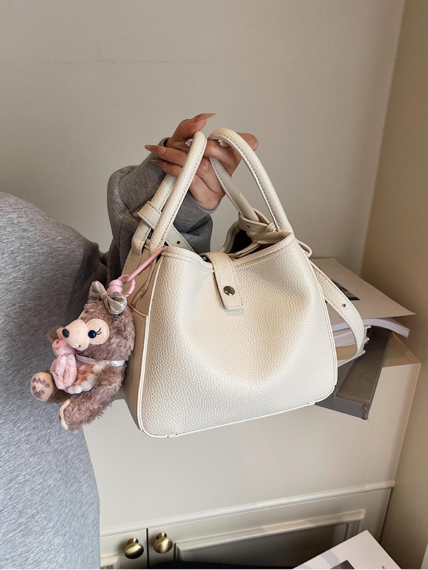 Venta caliente de comercio exterior bolso de cubo de verano mujer 2025 bolso de canasta de verduras de mano nueva tendencia bolso de mensajero de alta gama de todos los partidos