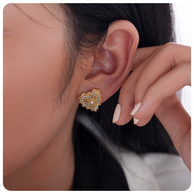 Taina europa 18k oro verdadero electro galvanizado de acero de moda viento de viaje irradiando luz amor aretes de acero inoxidable al por mayor