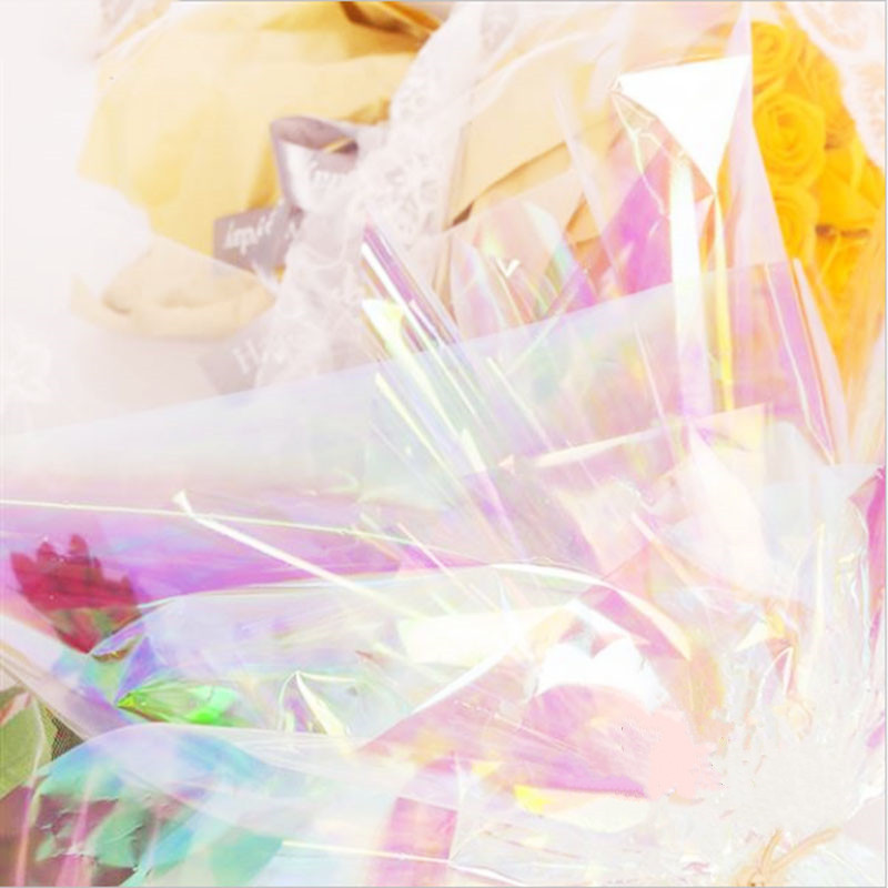 Christmas Safety Fruit Packaging Paper 1.8 Silk Symphony Película láser Película de vidrio Flores Material de bricolaje Paquete colorido Piruleta