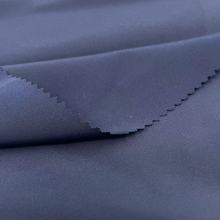 厂家直供75/100涤纶花瑶光华尼2*2户外休闲服面料 全涤防水花瑶