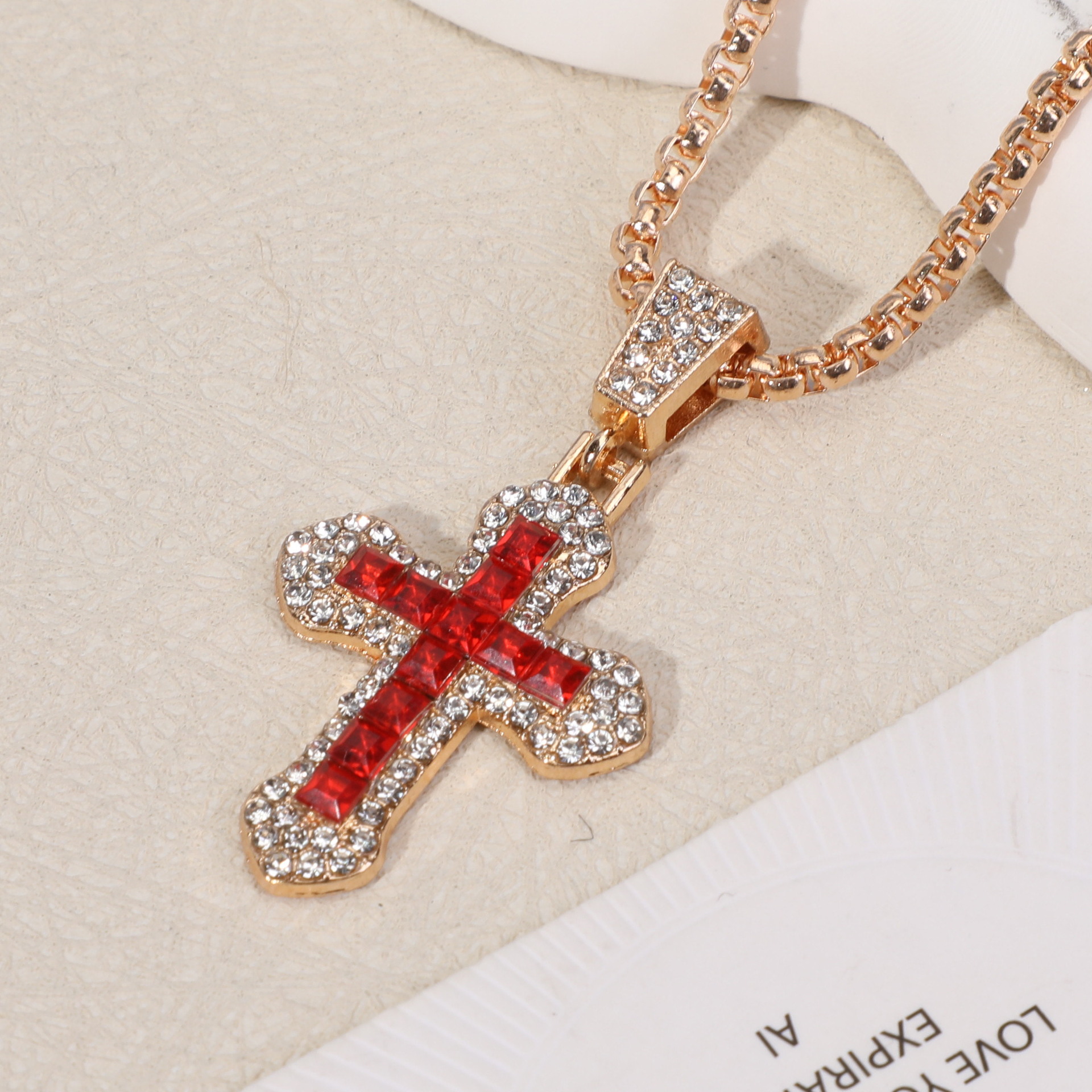 Red pendant gold chain