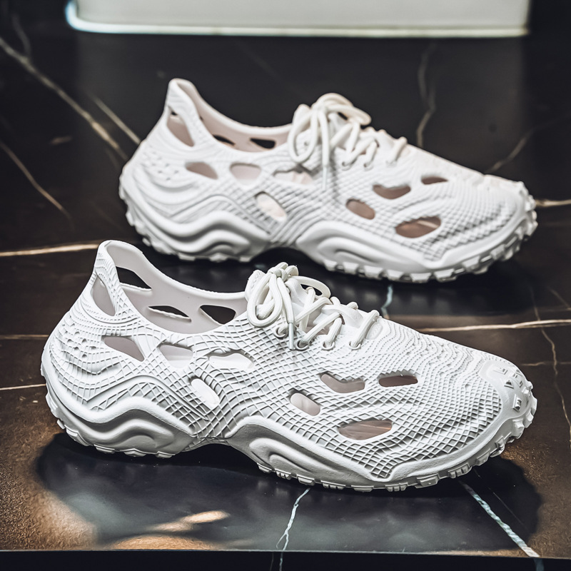 Comercio exterior transfronterizo zapatos con agujeros para hombres 2025 nueva playa moda de verano sandalias zapatillas zapatos de cabeza al por mayor