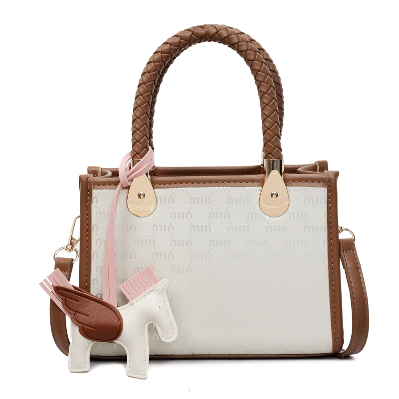 Estilo explosivo transfronterizo con un pequeño bolso cuadrado para mujer 2025 nuevo bolso de hombro tejido de todo fósforo de moda bolso de mensajero de moda