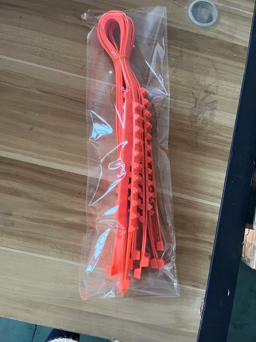 Car tire anti-slip chains, orange plastic straps, universal for winter and snowy conditions, easy to install, wholesale for cross-border sales