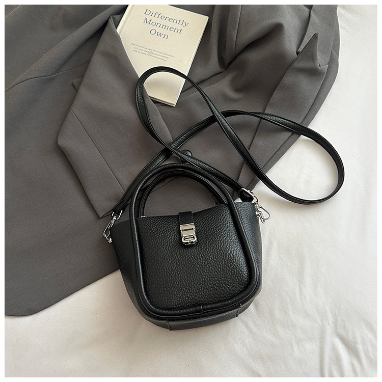 Bolso de cubo para mujer, tendencia transfronteriza de alta gama, bolso de mano con patrón de lichi, viaje diario, bolsa de mensajero de canasta de verduras de estilo occidental