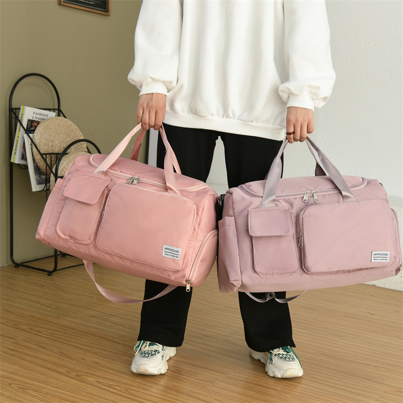 Bolsa de fitness de las mujeres al por mayor nueva gran capacidad crossbody bolsa de deportes de los hombres moda simple impermeable bolsa casual bolsa de viaje
