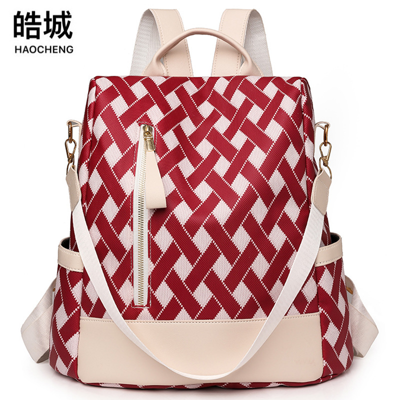 Mochila antirrobo de comercio exterior transfronterizo para mujer 2024 nueva moda color contraste mochila de viaje al aire libre mochila escolar de nailon de doble uso