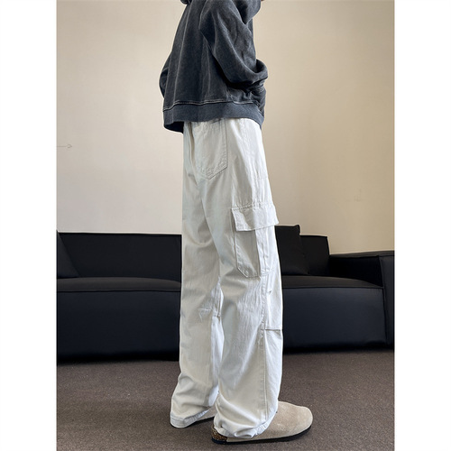 American-style functional multi-pocket casual lumberjack overalls—unisex, versatile, relaxed-fit, with slightly flared wide legs and a parachute-inspired design for spring and fall.