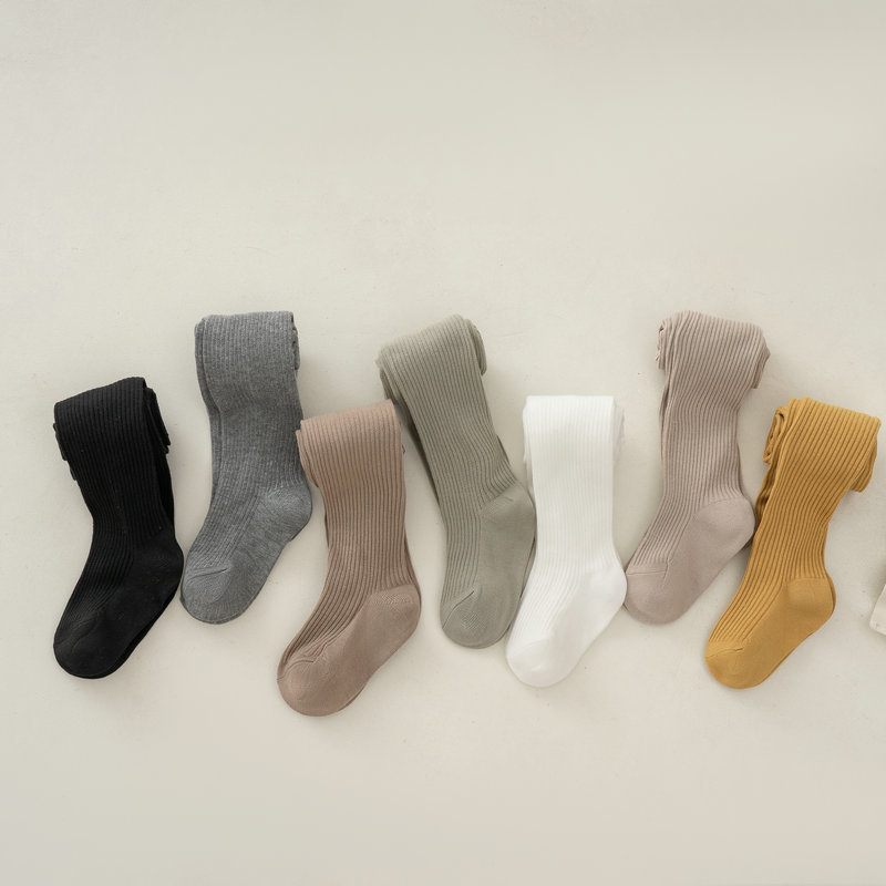 Nuevo color sólido rayas verticales polainas de las muchachas del otoño y el invierno estilo coreano ocasional los niños ropa exterior pantimedias blancas en stock