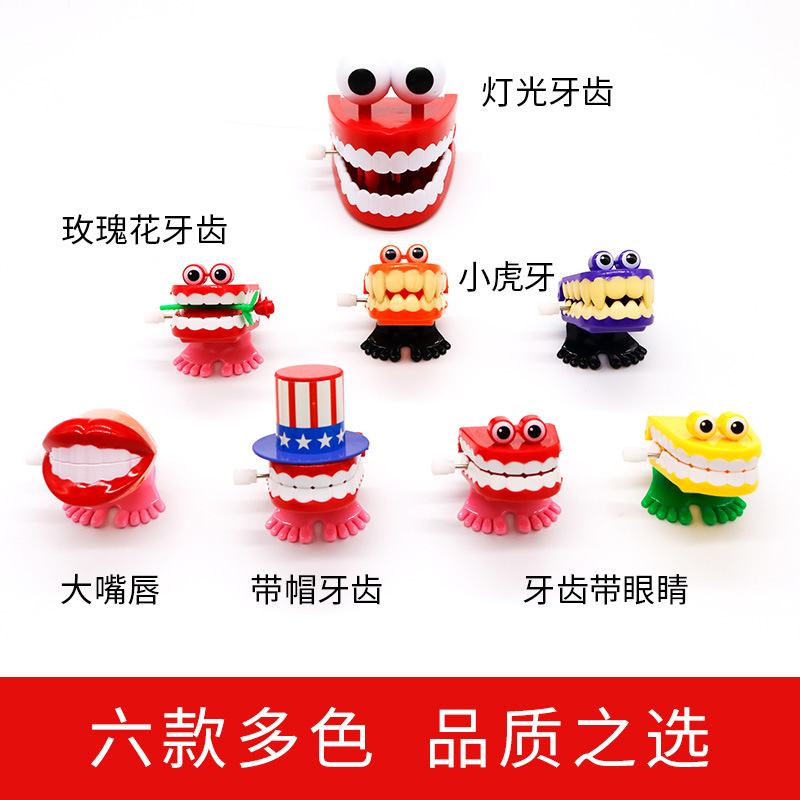 Juguetes dentales dientes de salto juguetes para niños juguetes de relojería dientes en forma de dientes saltando Rana regalos de jardín de infantes