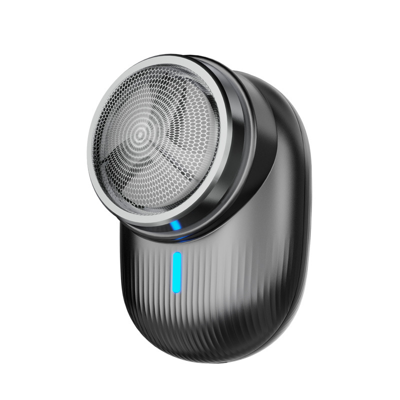 Tiktok Venta caliente mini máquina de afeitar eléctrica USB recargable impermeable los hombres viaje portátil barba cuchillo