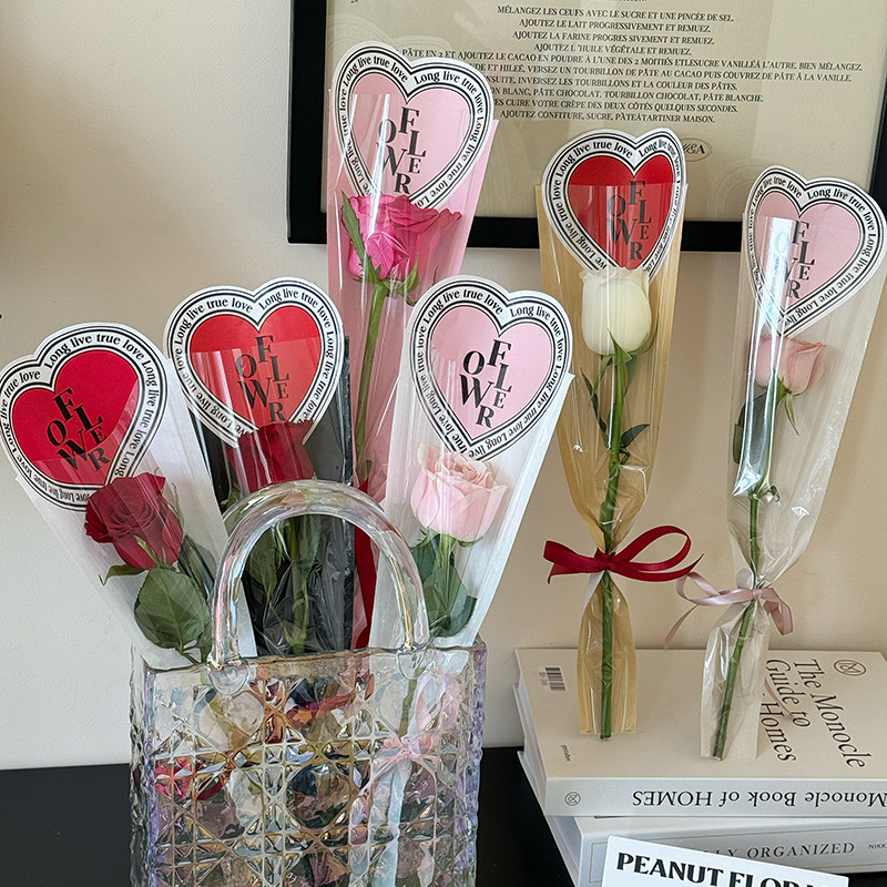 Huaxi día de San Valentín Crohe corazón una sola bolsa integral de papel de embalaje de flores bolsa de cuero transparente material floral