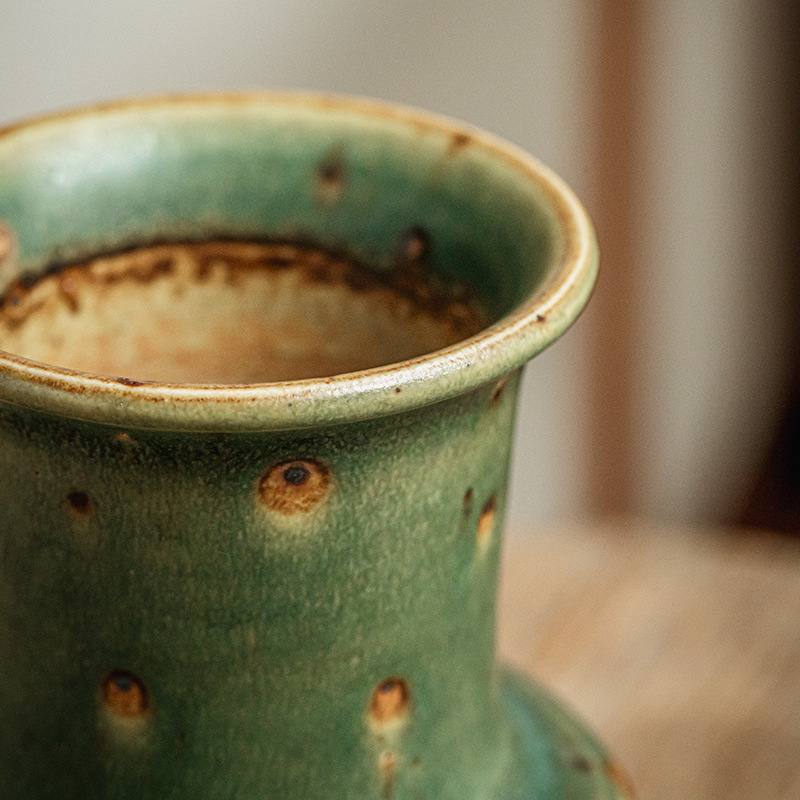 Hacer vieja sensación de manchas de cerámica dura japonesa jarrón verde sala de té decorador de flores de alojamiento residencial exportación transfronteriza decoración de estilo retro