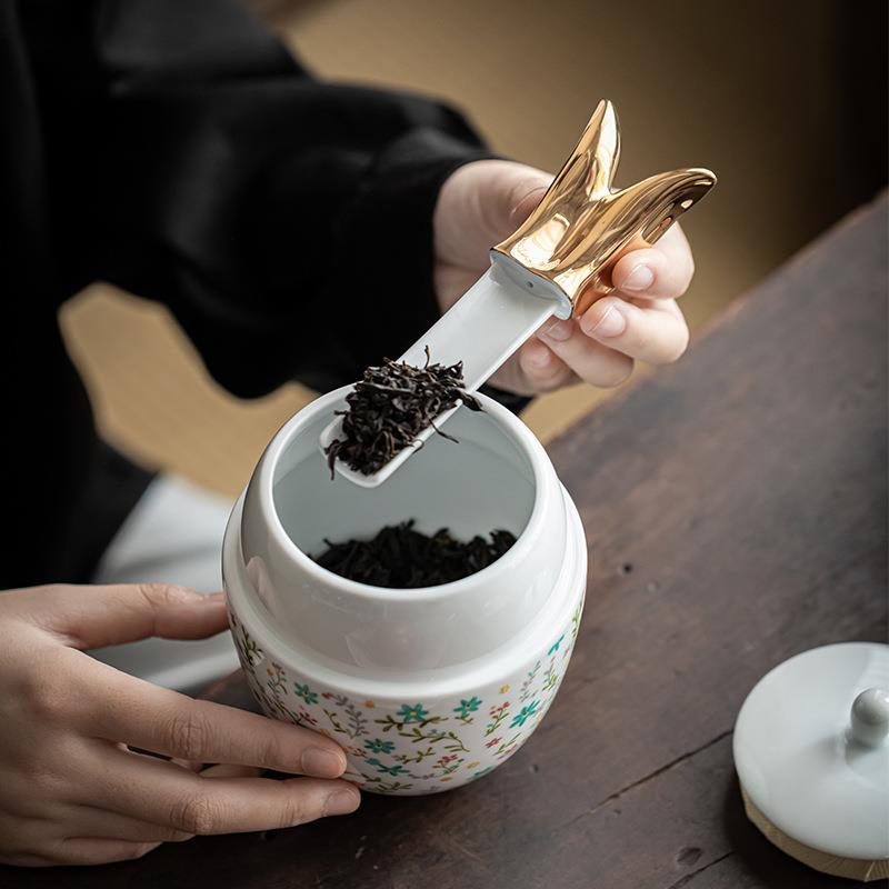 Creativo francés floral conejo té tarro con la selección de té de cerámica dibujo de oro conejo decoración sellada empresa regalo de vacaciones