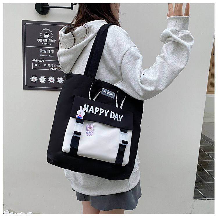 Large-capacity file bag, primary school student handbag that can be carried on one shoulder, book bag for girls with high appearance standards, homework books and test papers bag undefined