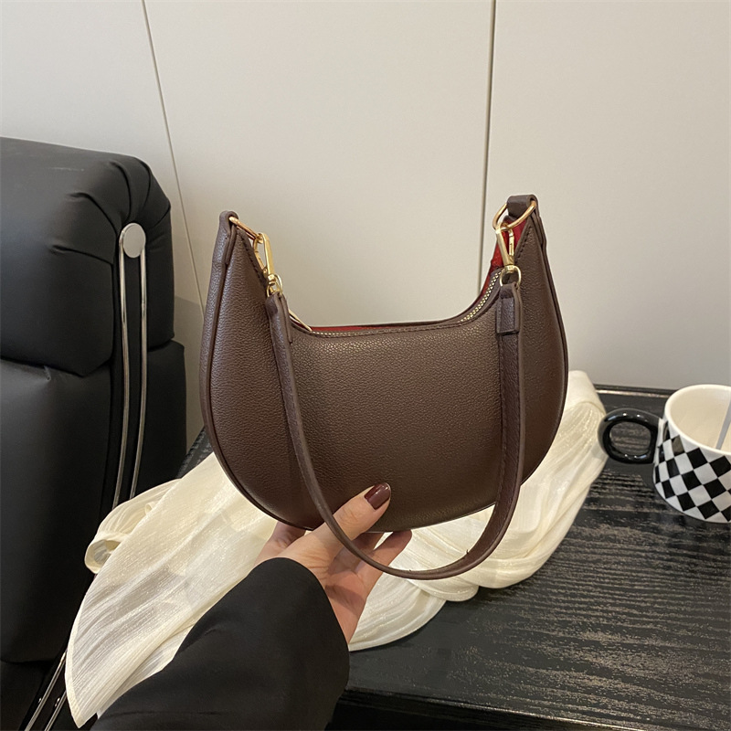 2025 primavera y verano nueva moda ocio media luna bolso bolso de nicho bolso de mujer minimalista bolso de hombro axilar