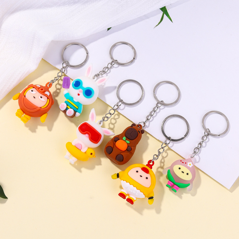Nuevos llaveros de dibujos animados Capibara conejo blanco huevo colgante de fiesta mochila decoración