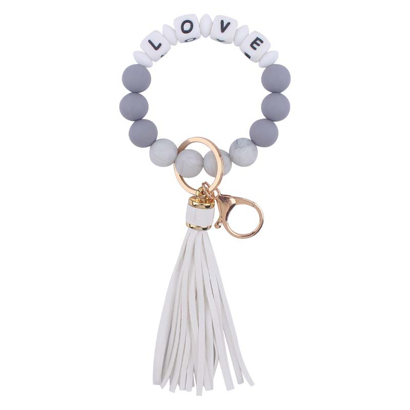 Nuevo cuero pu borla colgante llavero creativo DIY nombre cuentas de silicona con cuentas contraste color colgante llavero
