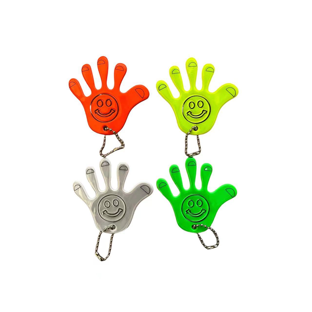 Fuente de fabricación sonriente creativa palma de PVC colgante reflectante bolsos accesorios colgantes