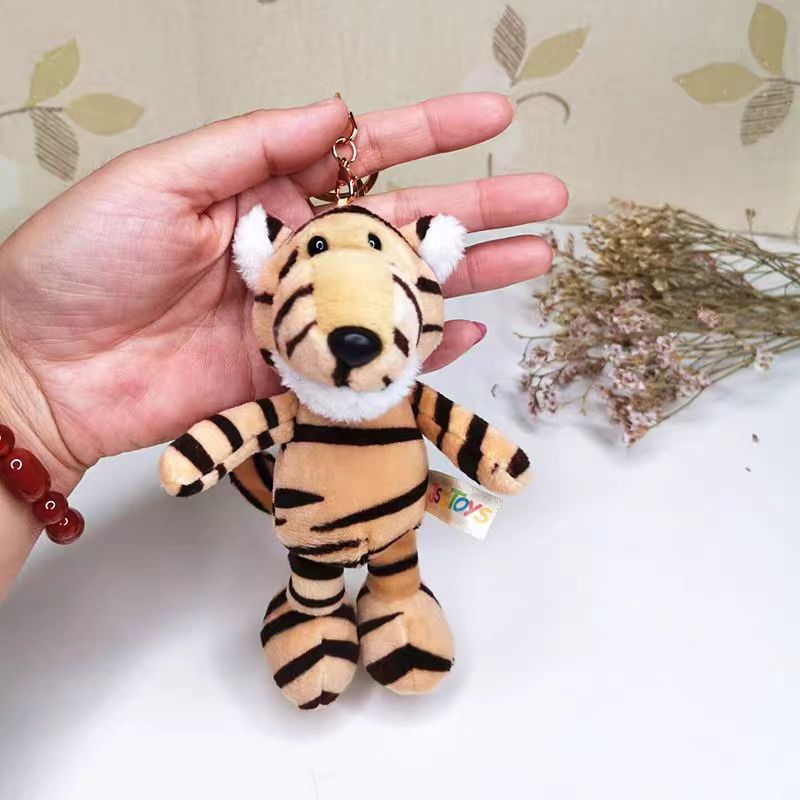 Nuevo transfronterizo jungla animal llavero elefante león colgante juguetes de peluche decoración bolsos llavero al por mayor