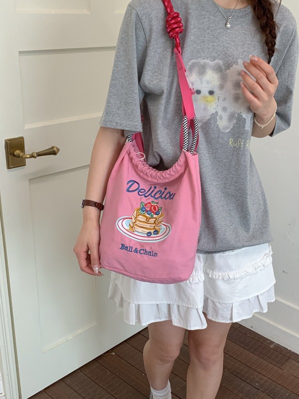 Bolsa de compras portátil bordada japonesa con cremallera para mujeres 2026 nuevo nicho de moda de cuerda versátil mochila