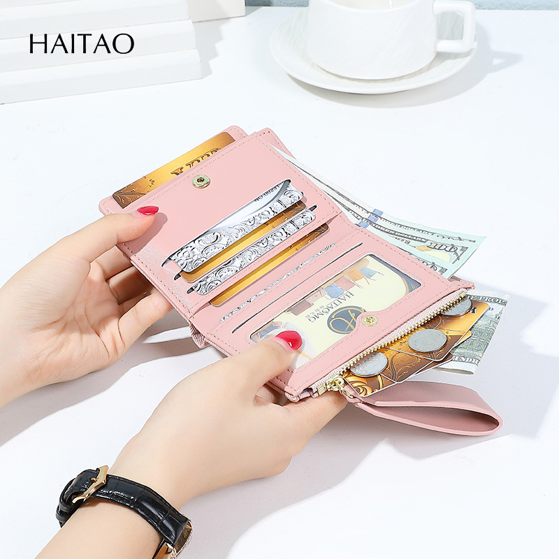 Nueva billetera de mujer corta bolsa de tarjetas de color sólido2025 mujeres de alto nivel sentido transfronterizo cremallera fuente de bolso de cambio fabricantes