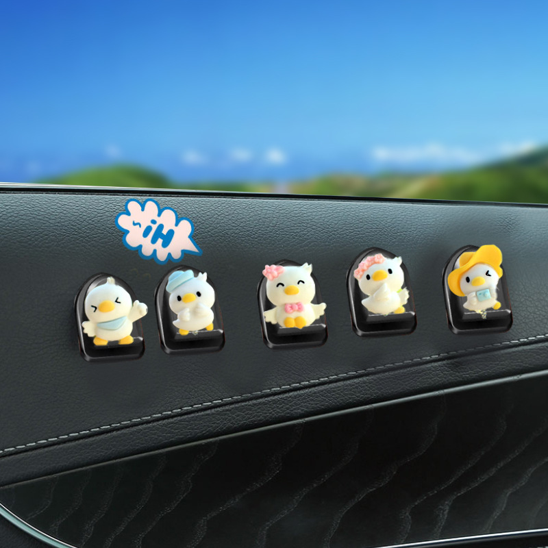 Clip de salida de aire de coche pequeño pato amarillo resina aromaterapia de coche perfume de coche adornos de dibujos animados accesorios de decoración suministros de coche