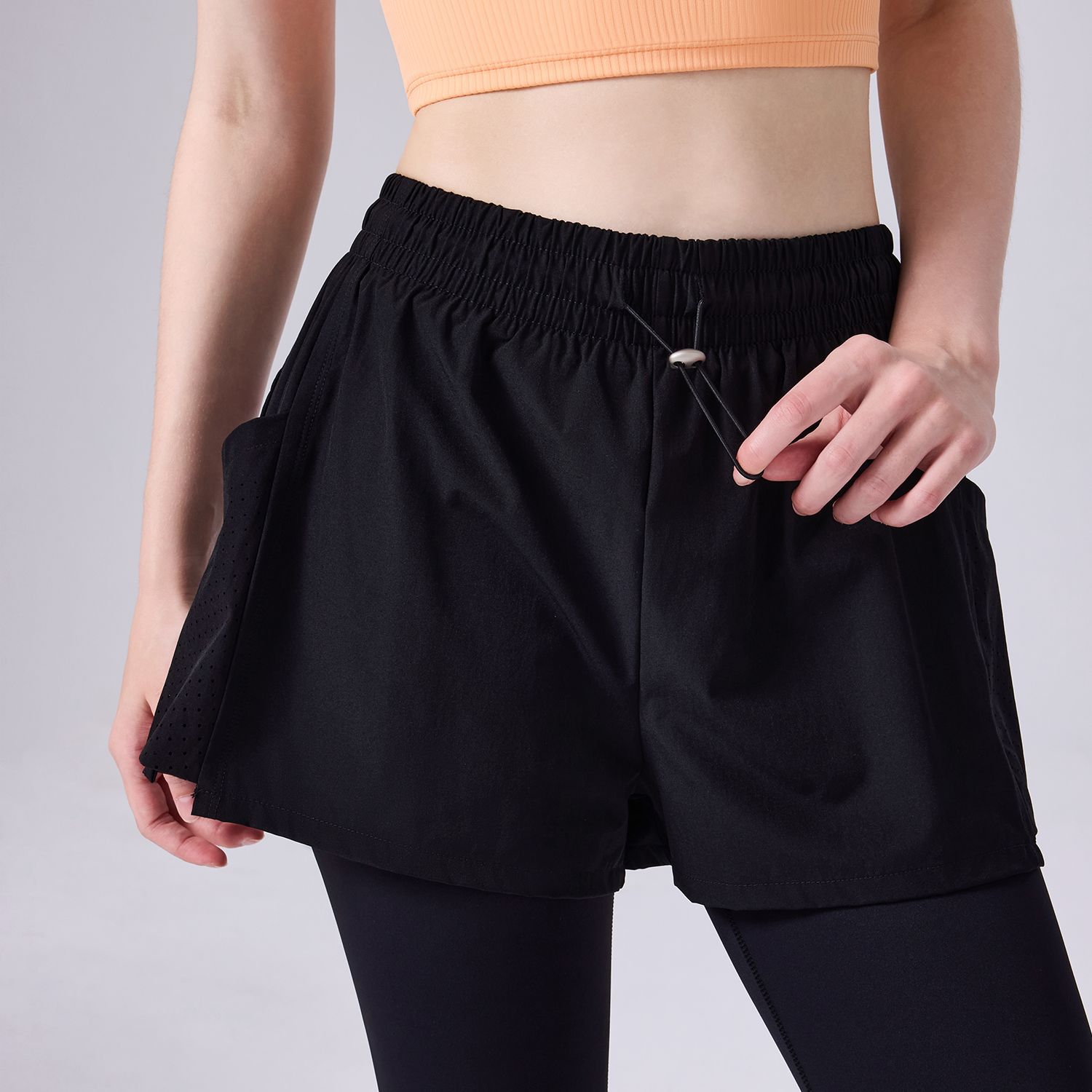 Falso de dos piezas de una pieza de cuerda de extracción de pantalones anti-straying bolsillo deportivo de fitness para correr pantalones transpirables para mujeres