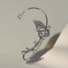 Platinum ear clips with zircon pearl