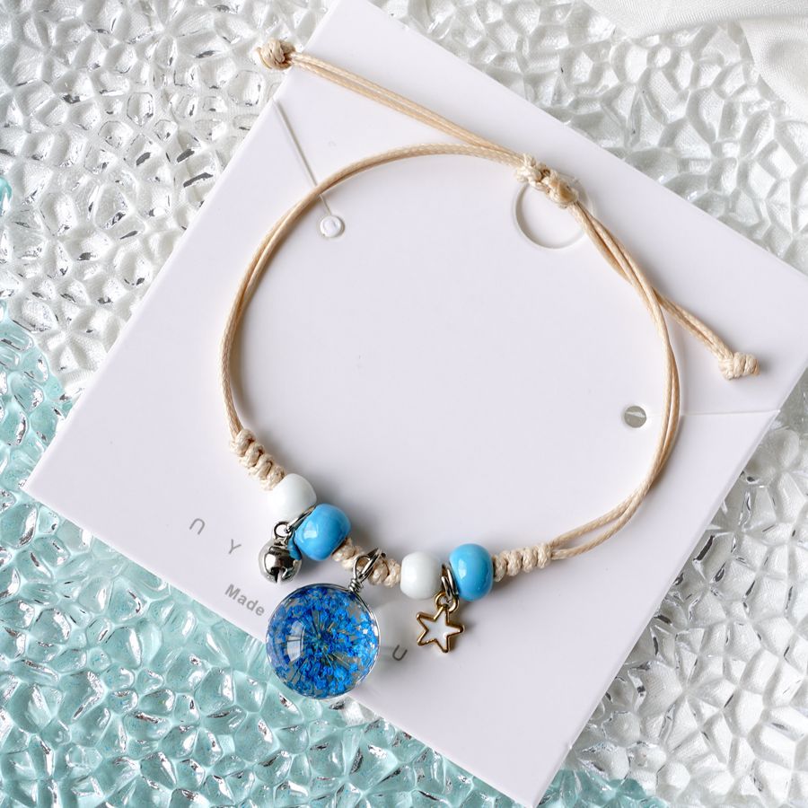 thumbnail image 1 of Pulsera de flor de durazno simple popular japonesa y coreana para todos los partidos literatura y arte femenino Estudiantes de Mori joyería de flores secas zafiro azul cielo estrellado, 1 of 2