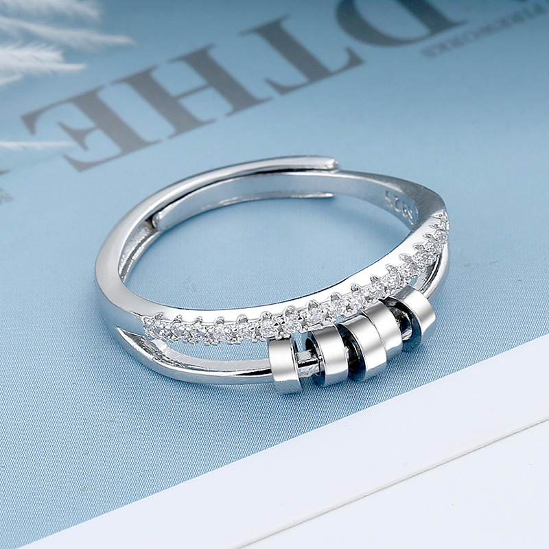 Europeo y americano transfronterizo caliente de cinco anillos de circón anillo giratorio Hipster hip hop personalidad giratoria anillo redondo anillo