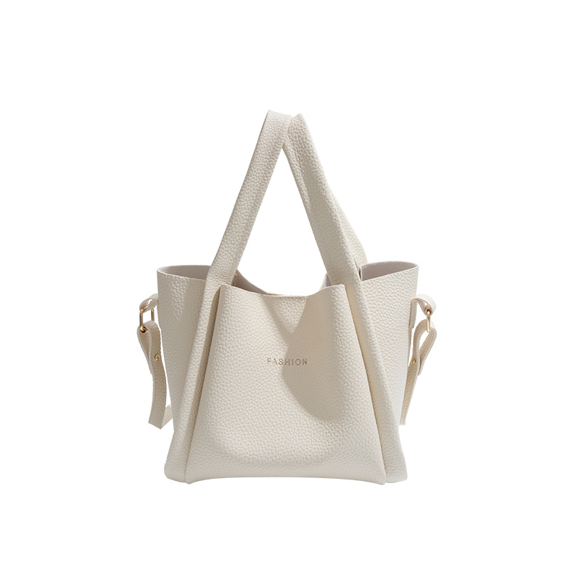 Conjunto de dos bolsos de mujer, primavera 2025, bolso de hombro de cuero suave, bolso bandolera informal y sencillo, popular este año.