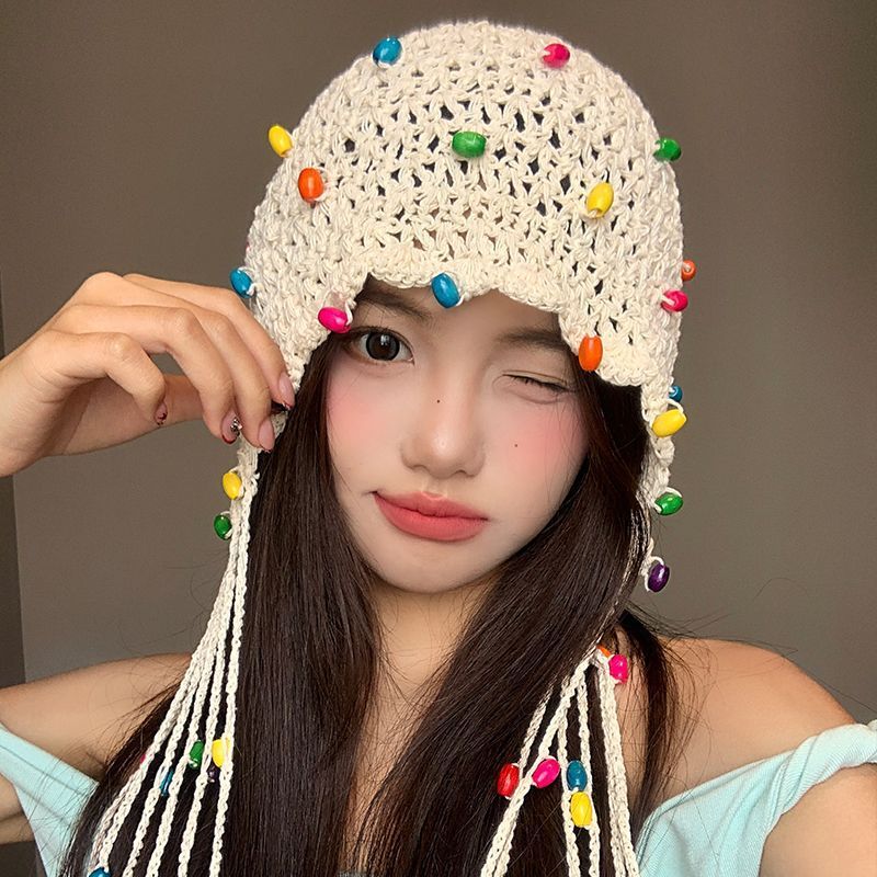 女性用の春夏の手織り中空つば帽子、エスニックスタイルのフックフラワー、タッセルストラップ、プルオーバーニット帽、多用途|undefined