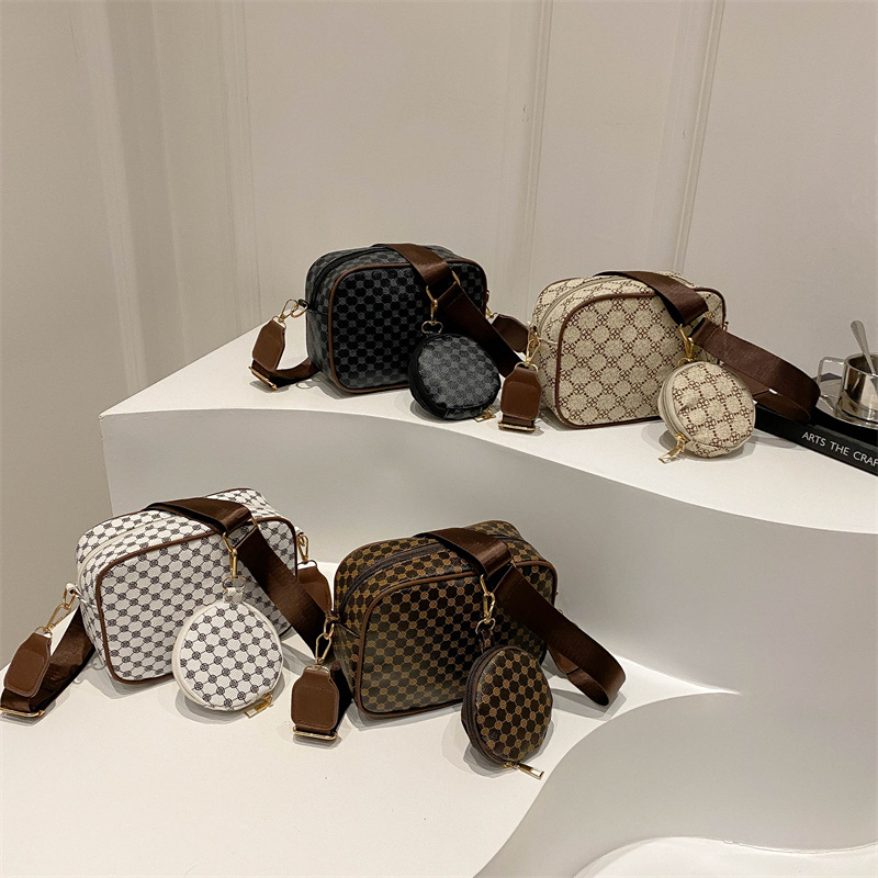 2024 nueva moda simple retro bolso impreso de mujer extranjero ancho cinturón de hombro bolso de hombro casual bolso de mochila