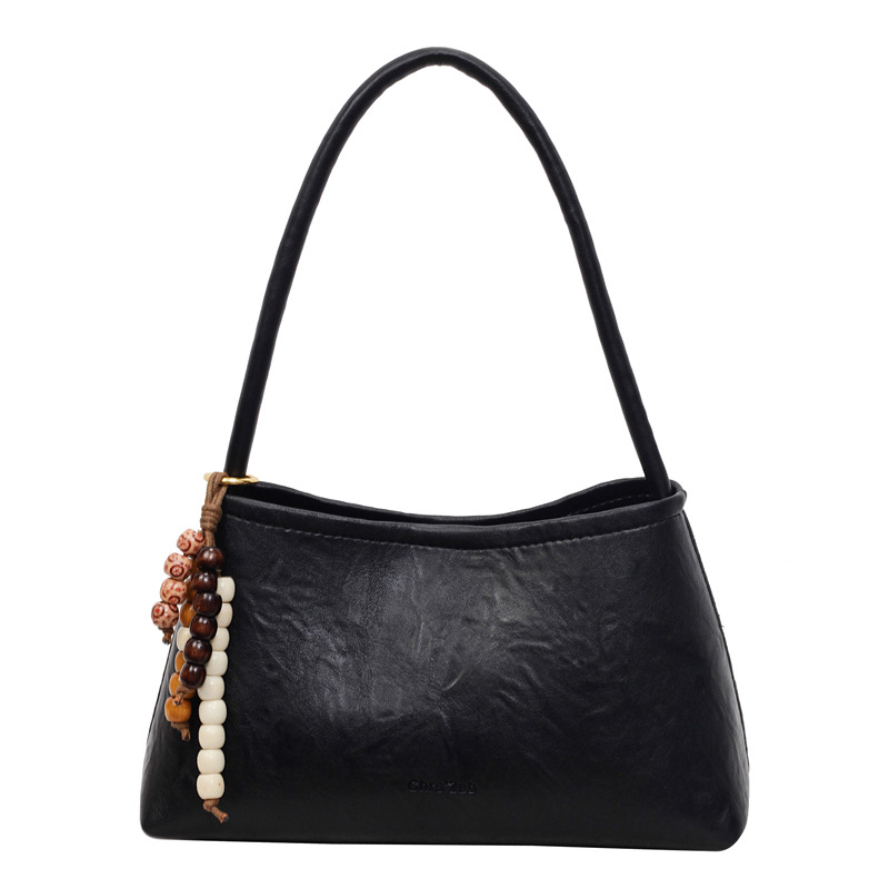 Bolsas transfronterizas para mujeres 2025, otoño y invierno, nuevo bolso coreano, bolso de brazo retro, bolso de hombro simple de moda para mujeres.