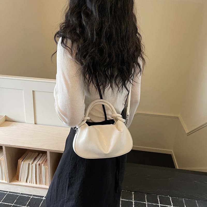 Textura de bolso de mano para mujeres 2026 nueva moda moda diaria de viaje de nicho coreano bolso de hombro