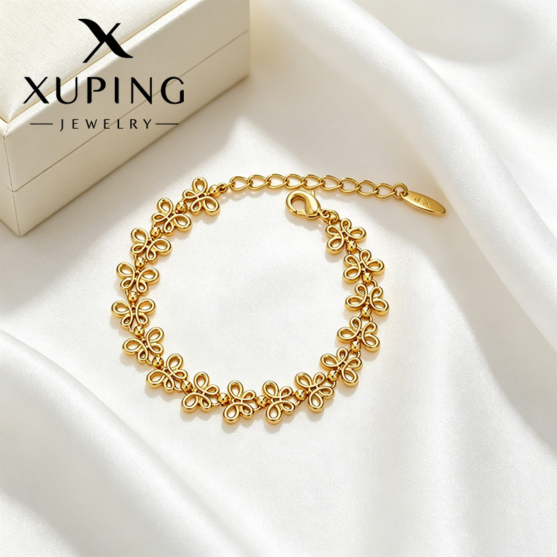 Xuping imitación de oro lujoso temperamento hueco pulsera mariposa aleación de cobre chapado 24k joyas transfronterizas europeas y estadounidenses al por mayor