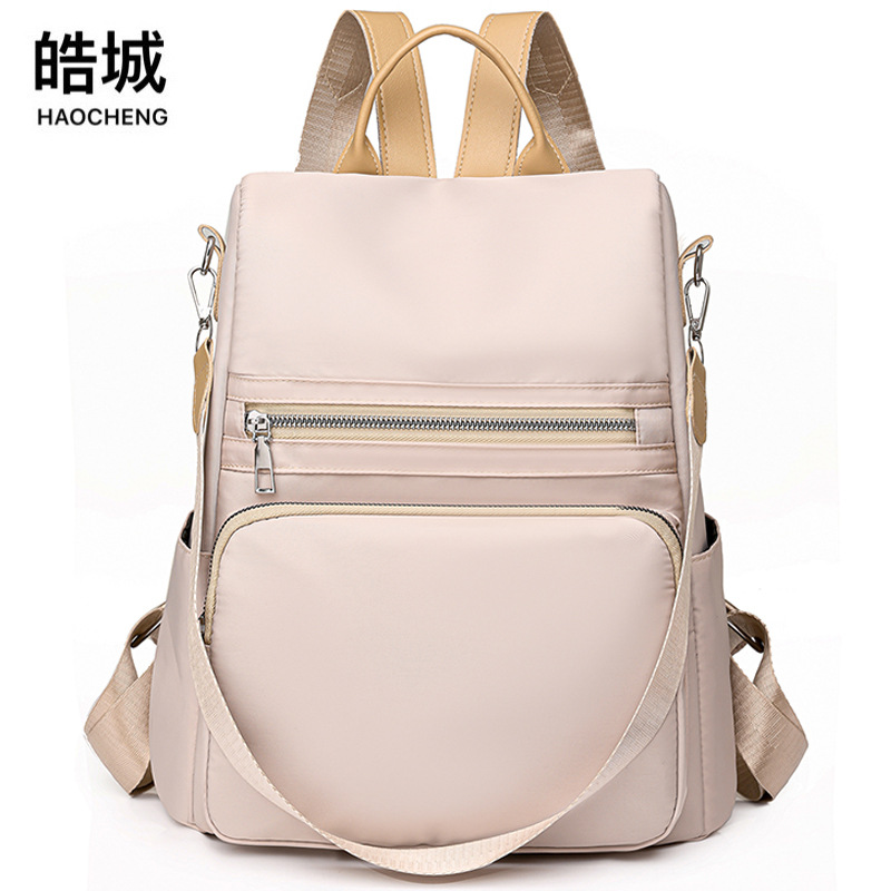 2023 nueva mochila antirrobo de nailon casual para mujer simple y versátil mochila de viaje al aire libre de gran capacidad al por mayor